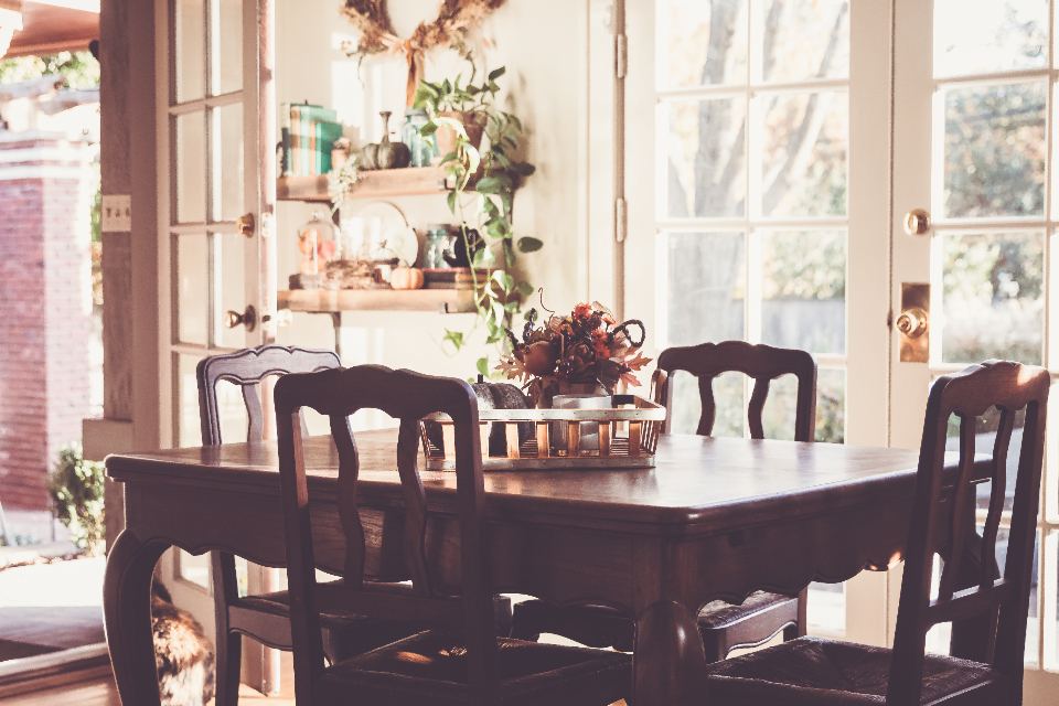 Classic dining room with wooden table and chairs