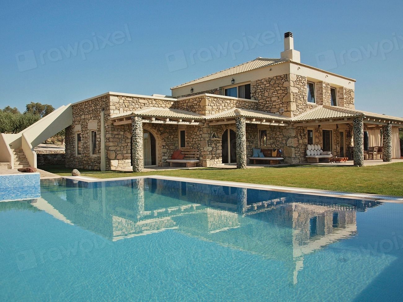 Stone-clad luxury villa with a swimming pool